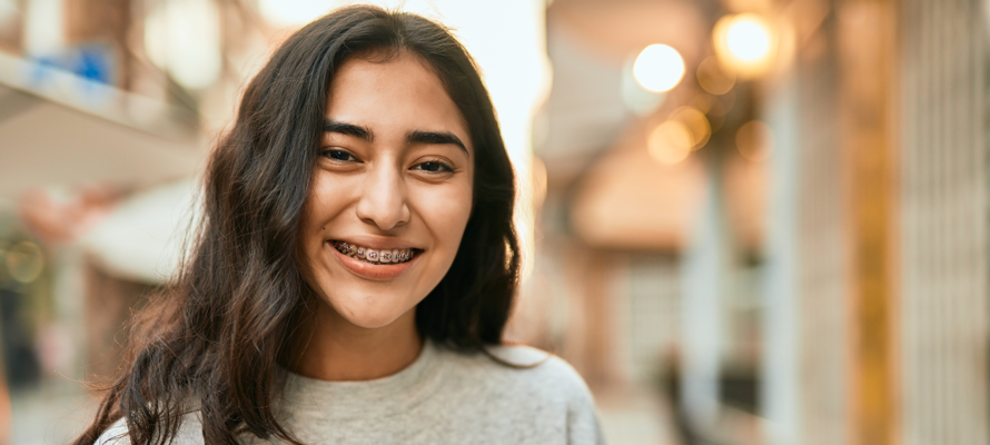 Smiling teenager with braces
